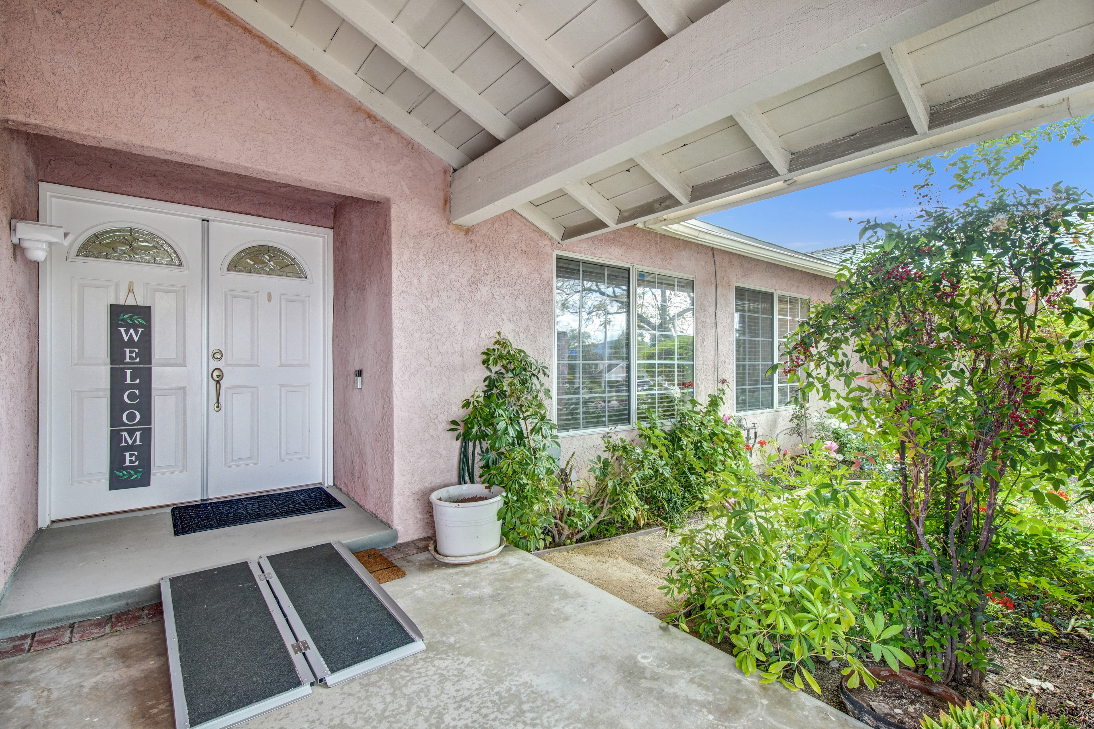 Welcoming front entrance with accessibility ramp